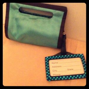 Mini clutch with a matching luggage tag